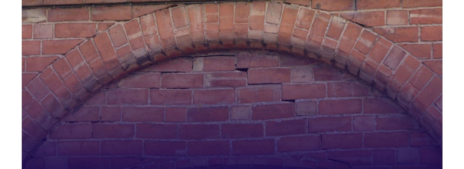 Assessing and strengthening masonry structures for sustainable reuse 